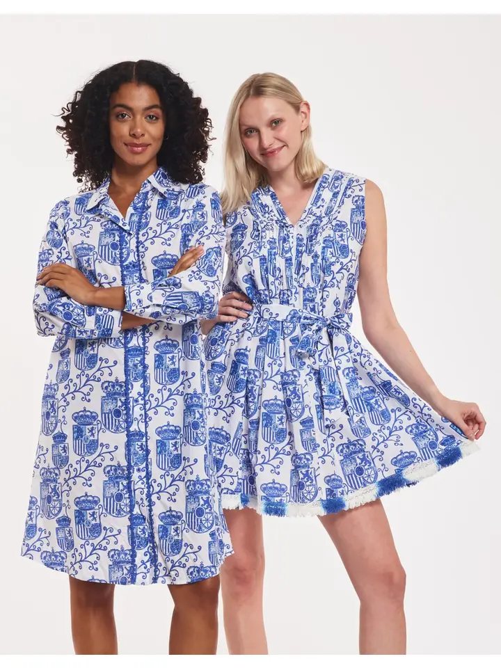 Felice Cotton Sevilla Dress – Sleeveless white cotton dress with blue tile print and tiered hem