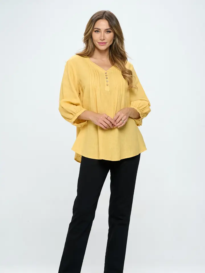 French Linen Pintuck Blouse – Lightweight button-down blouse with pintuck front and breathable linen fabric.