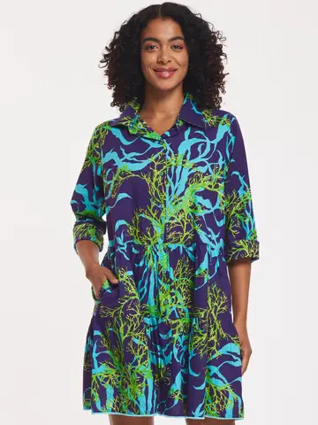 Alcee Cotton Swirl Dress – Lightweight cotton dress with v-neckline, puff sleeves, and bold coral, green, and indigo print.