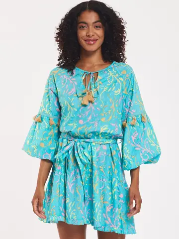 Alcee Cotton Miami Swirl Dress – Aqua Multi – Colorful cotton dress with puff sleeves, tiered skirt, and tropical swirl print.