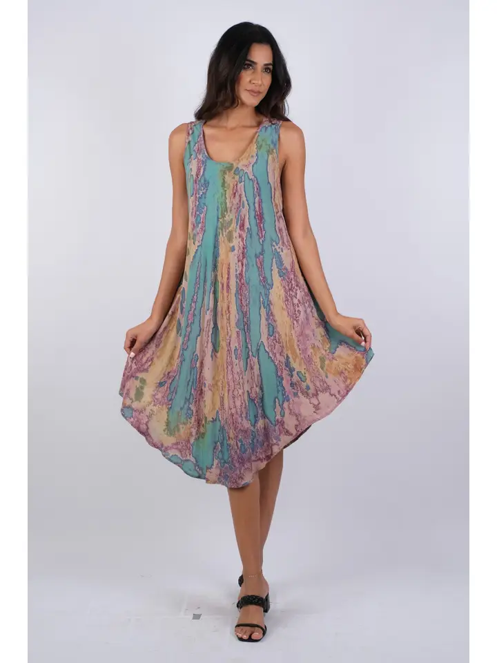 Woman wearing pastel purple tie-dye sleeveless dress made of soft rayon